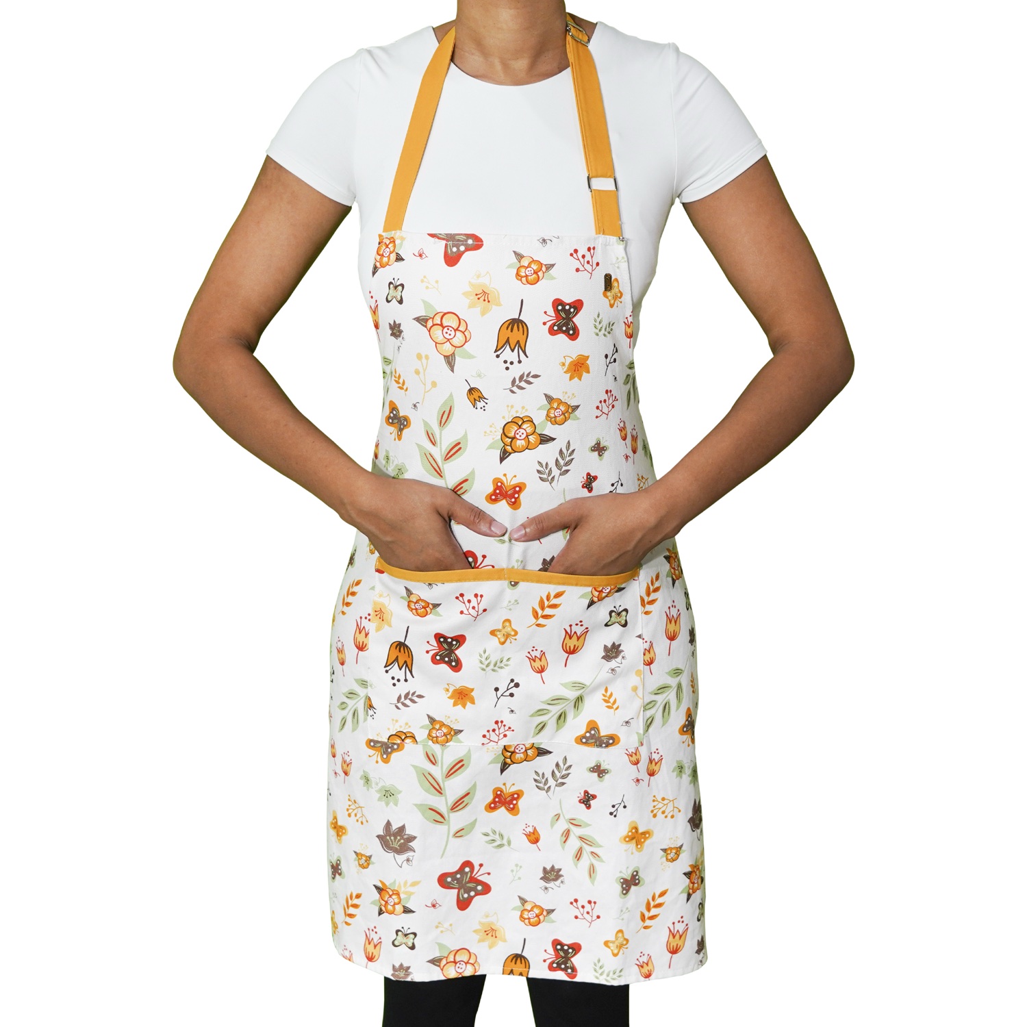 Model wearing the floral apron with yellow neck and pocket trim